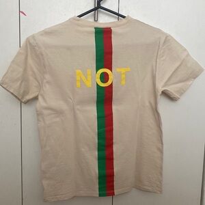 Gucci “Not Fake” tshirt.